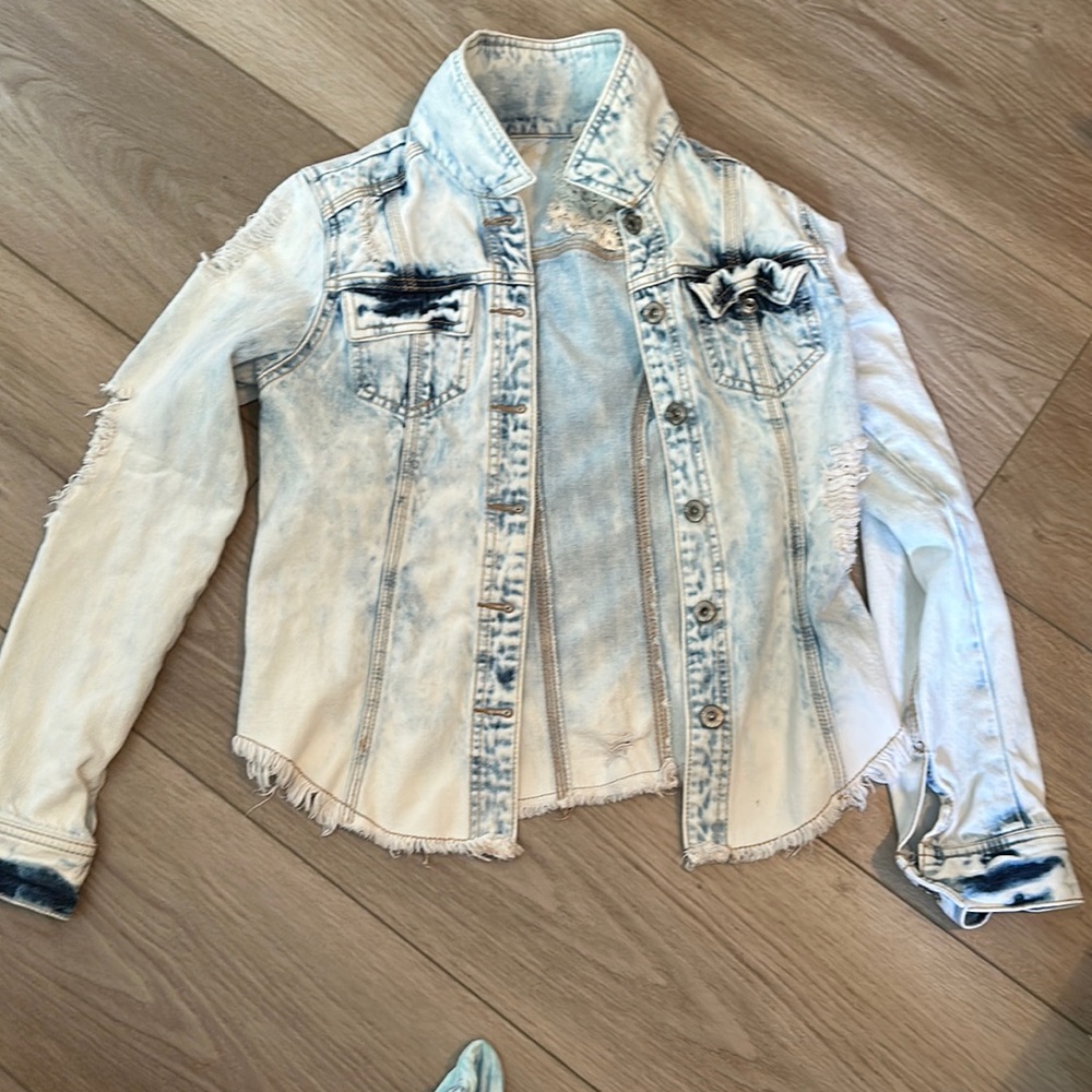 Bleached, distressed denim jacket